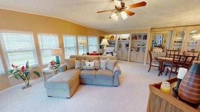 Welcome to this spacious double-wide manufactured home located on Highlands Ridge Golf Course - South in Florida - for sale on GolfHomes.com, golf home, golf lot