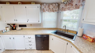 Welcome to this spacious double-wide manufactured home located on Highlands Ridge Golf Course - South in Florida - for sale on GolfHomes.com, golf home, golf lot
