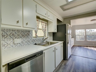 Come and see this remodeled 2/2 home on a quiet Cul De Sac in on Zellwood Station Country Club in Florida - for sale on GolfHomes.com, golf home, golf lot