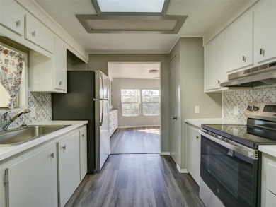 Come and see this remodeled 2/2 home on a quiet Cul De Sac in on Zellwood Station Country Club in Florida - for sale on GolfHomes.com, golf home, golf lot