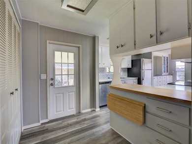 Seeing is believing....... this tastefully remodeled home is one on Zellwood Station Country Club in Florida - for sale on GolfHomes.com, golf home, golf lot