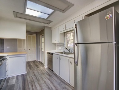 Seeing is believing....... this tastefully remodeled home is one on Zellwood Station Country Club in Florida - for sale on GolfHomes.com, golf home, golf lot