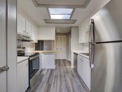 Seeing is believing....... this tastefully remodeled home is one on Zellwood Station Country Club in Florida - for sale on GolfHomes.com, golf home, golf lot