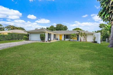 Welcome to 4235 Hickory Drive, a true treasure in the heart of on BallenIsles Golf and Country Club in Florida - for sale on GolfHomes.com, golf home, golf lot