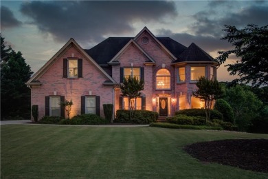 Welcome to this breathtaking 6-bedroom, 5-bathroom home offering on Hamilton Mill Golf Club in Georgia - for sale on GolfHomes.com, golf home, golf lot