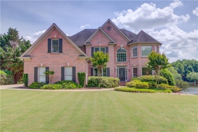 Welcome to this breathtaking 6-bedroom, 5-bathroom home offering on Hamilton Mill Golf Club in Georgia - for sale on GolfHomes.com, golf home, golf lot
