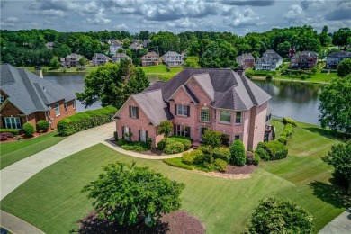 Welcome to this breathtaking 6-bedroom, 5-bathroom home offering on Hamilton Mill Golf Club in Georgia - for sale on GolfHomes.com, golf home, golf lot