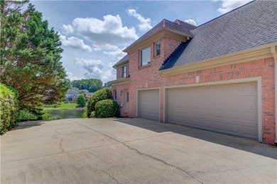 Welcome to this breathtaking 6-bedroom, 5-bathroom home offering on Hamilton Mill Golf Club in Georgia - for sale on GolfHomes.com, golf home, golf lot