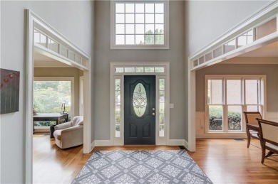 Welcome to this breathtaking 6-bedroom, 5-bathroom home offering on Hamilton Mill Golf Club in Georgia - for sale on GolfHomes.com, golf home, golf lot