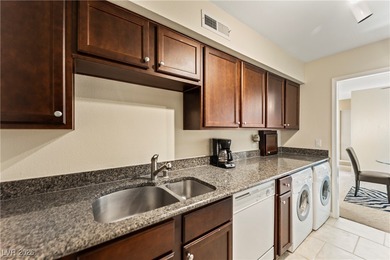 Fully furnished unit offering Strip, golf course, and pool views on Las Vegas Country Club in Nevada - for sale on GolfHomes.com, golf home, golf lot