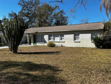 This house is for Sale.  Charming Home with Golf Course Views in on Babe Zaharias Golf Course in Florida - for sale on GolfHomes.com, golf home, golf lot