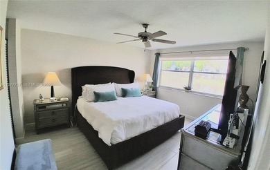 Beautifully remodeled, move-in-ready, two-bedroom, two-bathroom on Sunrise Lakes Phase IV Golf Course in Florida - for sale on GolfHomes.com, golf home, golf lot