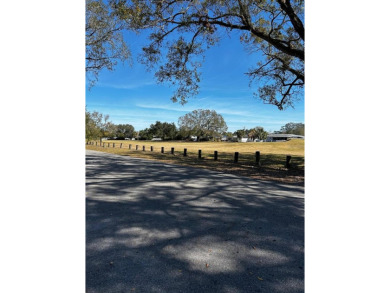 This house is for Sale.  Charming Home with Golf Course Views in on Babe Zaharias Golf Course in Florida - for sale on GolfHomes.com, golf home, golf lot