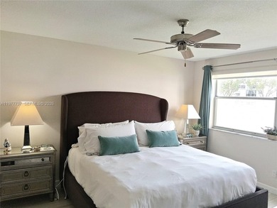 Beautifully remodeled, move-in-ready, two-bedroom, two-bathroom on Sunrise Lakes Phase IV Golf Course in Florida - for sale on GolfHomes.com, golf home, golf lot