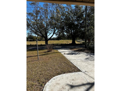 This house is for Sale.  Charming Home with Golf Course Views in on Babe Zaharias Golf Course in Florida - for sale on GolfHomes.com, golf home, golf lot