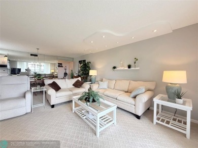 This SPACIOUS & ELEGANT 3 bed-2 bath CORNER unit offers a on Inverrary Country Club in Florida - for sale on GolfHomes.com, golf home, golf lot