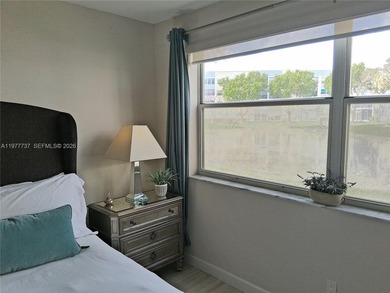 Beautifully remodeled, move-in-ready, two-bedroom, two-bathroom on Sunrise Lakes Phase IV Golf Course in Florida - for sale on GolfHomes.com, golf home, golf lot