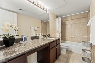 Fully furnished unit offering Strip, golf course, and pool views on Las Vegas Country Club in Nevada - for sale on GolfHomes.com, golf home, golf lot