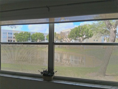 Beautifully remodeled, move-in-ready, two-bedroom, two-bathroom on Sunrise Lakes Phase IV Golf Course in Florida - for sale on GolfHomes.com, golf home, golf lot