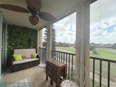 This SPACIOUS & ELEGANT 3 bed-2 bath CORNER unit offers a on Inverrary Country Club in Florida - for sale on GolfHomes.com, golf home, golf lot