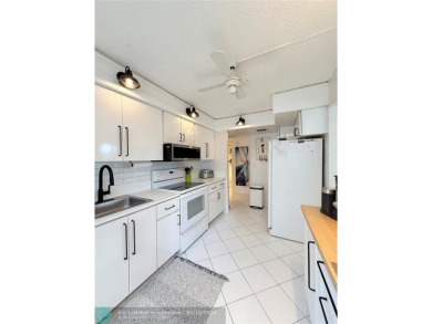 This SPACIOUS & ELEGANT 3 bed-2 bath CORNER unit offers a on Inverrary Country Club in Florida - for sale on GolfHomes.com, golf home, golf lot