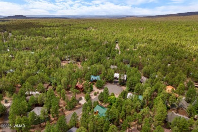 Charming Cabin in Pinetop Lakes. Tucked away on a quiet on Pinetop Lakes Country Club in Arizona - for sale on GolfHomes.com, golf home, golf lot