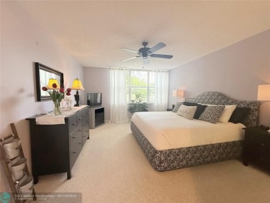 This SPACIOUS & ELEGANT 3 bed-2 bath CORNER unit offers a on Inverrary Country Club in Florida - for sale on GolfHomes.com, golf home, golf lot