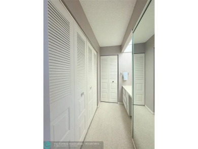 This SPACIOUS & ELEGANT 3 bed-2 bath CORNER unit offers a on Inverrary Country Club in Florida - for sale on GolfHomes.com, golf home, golf lot