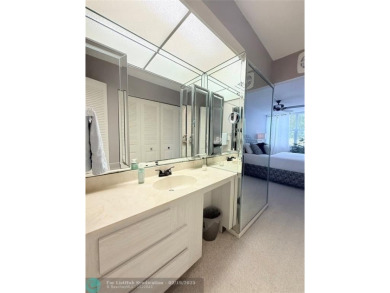 This SPACIOUS & ELEGANT 3 bed-2 bath CORNER unit offers a on Inverrary Country Club in Florida - for sale on GolfHomes.com, golf home, golf lot