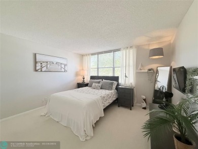 This SPACIOUS & ELEGANT 3 bed-2 bath CORNER unit offers a on Inverrary Country Club in Florida - for sale on GolfHomes.com, golf home, golf lot