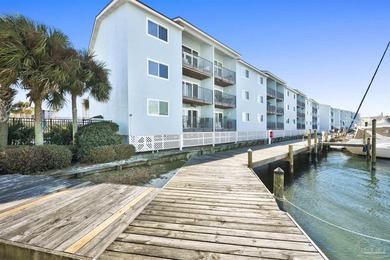 This one is a MUST SEE! The sunsets from this unit are on Lost Key Golf Club in Florida - for sale on GolfHomes.com, golf home, golf lot