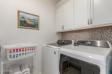 An exceptional home privately nestled within the gated community on Wildfire Golf Club in Arizona - for sale on GolfHomes.com, golf home, golf lot