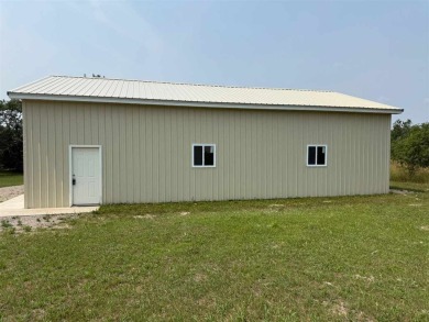 Introducing an extraordinary opportunity to own a brand-new on Wildwood Lakes in Michigan - for sale on GolfHomes.com, golf home, golf lot