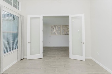 The Lakeside home-- where thoughtful space design and refined on Panther Run Golf Club in Florida - for sale on GolfHomes.com, golf home, golf lot