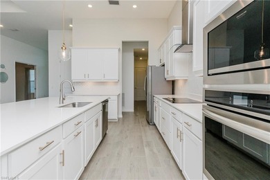 The Lakeside home-- where thoughtful space design and refined on Panther Run Golf Club in Florida - for sale on GolfHomes.com, golf home, golf lot