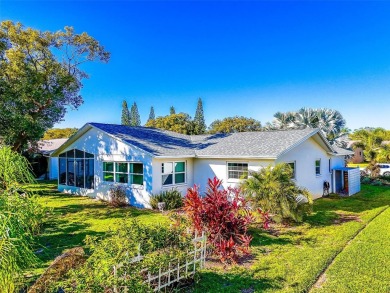 Welcome to a Retreat in Charm at 122 Stafford Dr., Palm Harbor on Highland Lakes Executive Golf Course in Florida - for sale on GolfHomes.com, golf home, golf lot