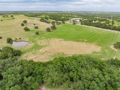 Beautiful acreage in prime location. With almost 900 ft of road on Decatur Golf and Country Club in Texas - for sale on GolfHomes.com, golf home, golf lot