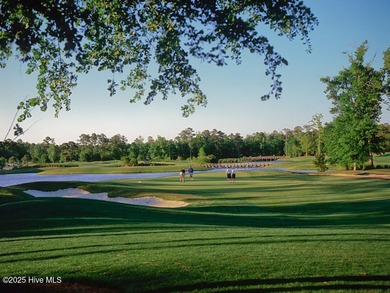 Discover the charm of Anchor, a 3-bed, 3.5-bath coastal home on Sea Trail Golf Resort in North Carolina - for sale on GolfHomes.com, golf home, golf lot