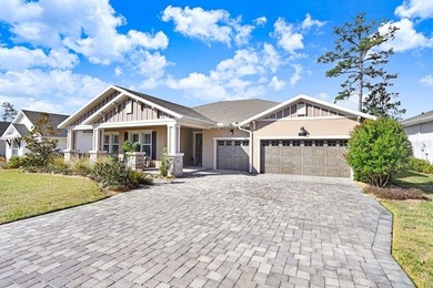 LIVE exceptionally in this 2022 custom-upgraded waterfront on Southern Hills Plantation Club in Florida - for sale on GolfHomes.com, golf home, golf lot