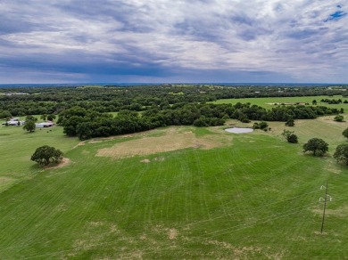 Beautiful acreage in prime location. With almost 900 ft of road on Decatur Golf and Country Club in Texas - for sale on GolfHomes.com, golf home, golf lot