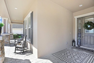 LIVE exceptionally in this 2022 custom-upgraded waterfront on Southern Hills Plantation Club in Florida - for sale on GolfHomes.com, golf home, golf lot