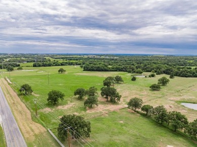 Beautiful acreage in prime location. With almost 900 ft of road on Decatur Golf and Country Club in Texas - for sale on GolfHomes.com, golf home, golf lot