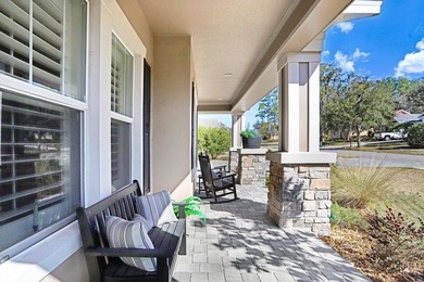 LIVE exceptionally in this 2022 custom-upgraded waterfront on Southern Hills Plantation Club in Florida - for sale on GolfHomes.com, golf home, golf lot