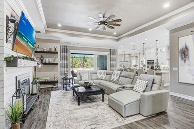 LIVE exceptionally in this 2022 custom-upgraded waterfront on Southern Hills Plantation Club in Florida - for sale on GolfHomes.com, golf home, golf lot