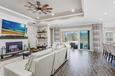 LIVE exceptionally in this 2022 custom-upgraded waterfront on Southern Hills Plantation Club in Florida - for sale on GolfHomes.com, golf home, golf lot