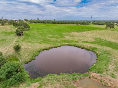 Beautiful acreage in prime location. With almost 900 ft of road on Decatur Golf and Country Club in Texas - for sale on GolfHomes.com, golf home, golf lot