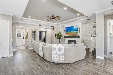 LIVE exceptionally in this 2022 custom-upgraded waterfront on Southern Hills Plantation Club in Florida - for sale on GolfHomes.com, golf home, golf lot