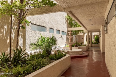 Tucked inside the beautifully landscaped Village Square Condos on Westbrook Village Golf Club in Arizona - for sale on GolfHomes.com, golf home, golf lot