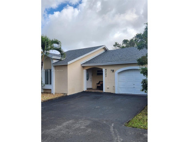 One story, single family, completely remodeled, 3 bedroom 2 on Jim McLean Signature Course in Florida - for sale on GolfHomes.com, golf home, golf lot