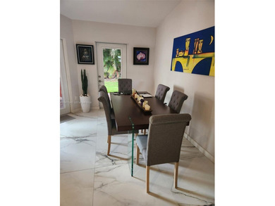 One story, single family, completely remodeled, 3 bedroom 2 on Jim McLean Signature Course in Florida - for sale on GolfHomes.com, golf home, golf lot